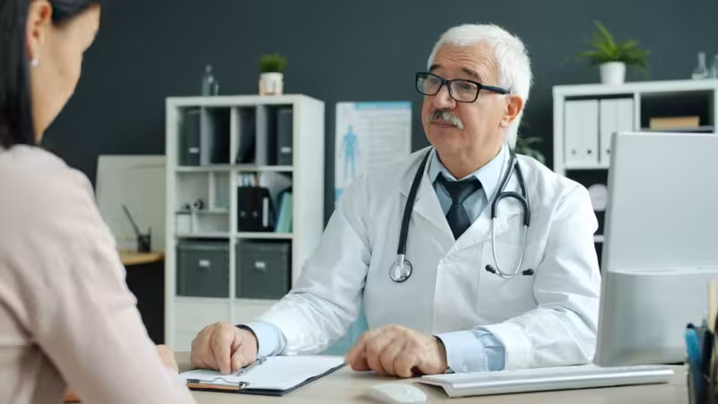 Why Choose an Independent Audiology Clinic in Muswell Hill: A doctor in a clinic Doctor in clinic for Why Choose an Independent Audiology Clinic in Muswell Hill - Walk In Clinic At Hearing First Muswell Hi...